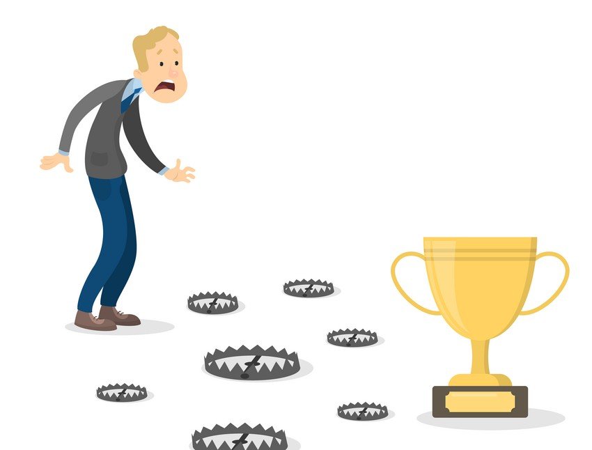 A man is standing in front of a trophy, reflecting on his last-minute review for the MCCQE Part 1 exam and traps for overdoing the review.
