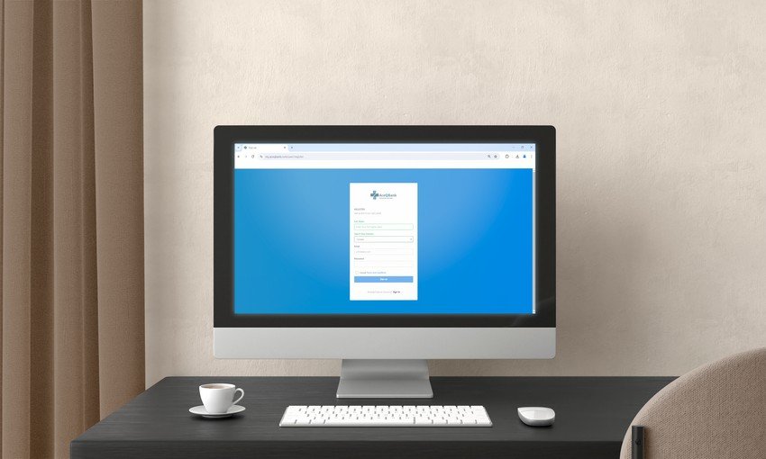 A computer monitor on a desk displaying a Ace Qbank Demo login page, with a coffee cup and a keyboard beside it, used for MCCQE1 exam preparation.