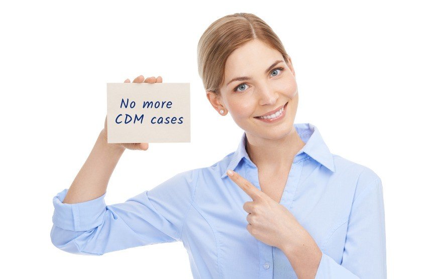 Wearing a blue shirt, the person smiles and points to a card with the text "No more CDM cases," symbolizing success achieved through mastering MCC Objectives.