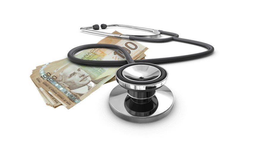 A stethoscope rests on a stack of Canadian dollar bills, symbolizing the connection between healthcare and finances—highlighting factors like doctor salary in Canada and the importance of MCCQE1 exam prep for medical professionals.