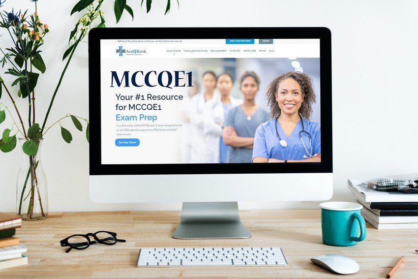 A computer monitor displays a medical exam prep website with a group of healthcare professionals and the headline "Ace QBank, Your #1 Resource for MCCQE1 Exam Prep.